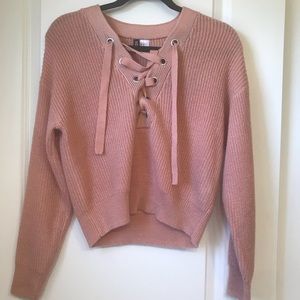 H&M pink lace-up sweater